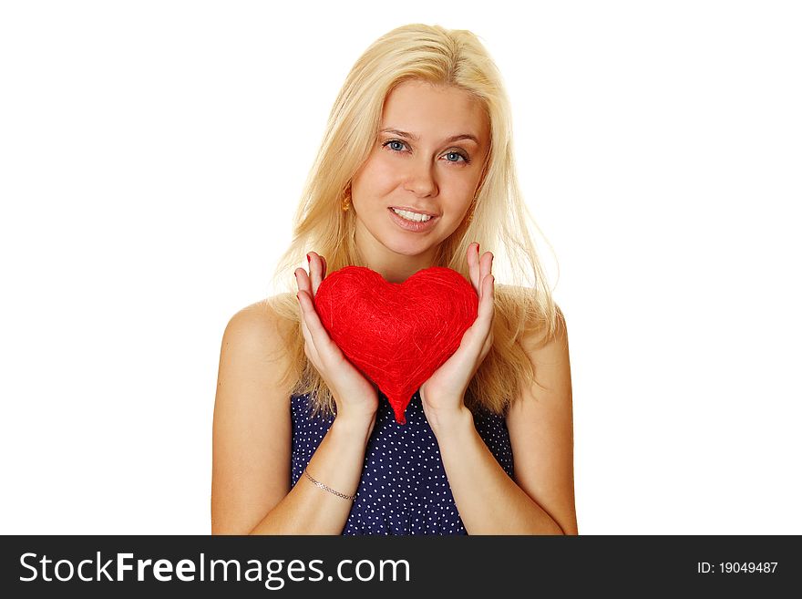 Young attractive happy woman holding big red heart. Isolated on a white background. Young attractive happy woman holding big red heart. Isolated on a white background