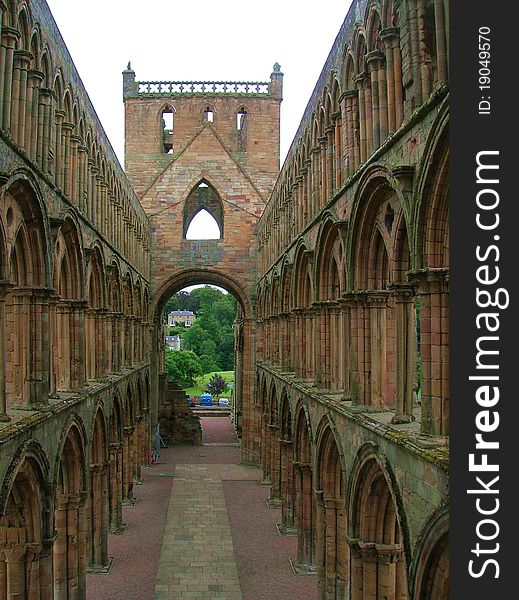 A look at the main nave of Jedbyrgh Abbey as it appears today. This is a ruined Augustinian abbey which was founded in the 12th century situated in the Scottish Borders. In 1671 the church was removed to the western part of the nave for safety reasons. A look at the main nave of Jedbyrgh Abbey as it appears today. This is a ruined Augustinian abbey which was founded in the 12th century situated in the Scottish Borders. In 1671 the church was removed to the western part of the nave for safety reasons.