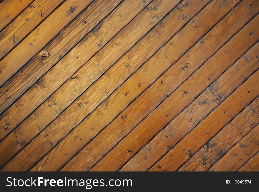 Brown wooden board, can be used as a background. Brown wooden board, can be used as a background