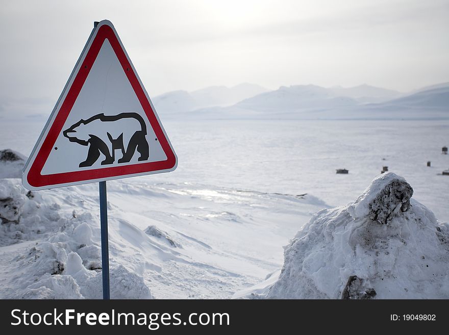Arctic roadsign with polar bear
