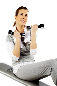 Girl Sitting Exercising With Weights Stock Image Girl Sitting Exercising With Weights Stock Image