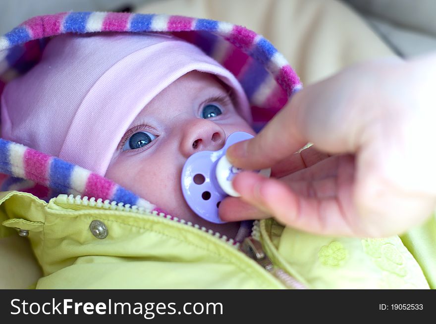 Beauty little girl in stroller. Beauty little girl in stroller