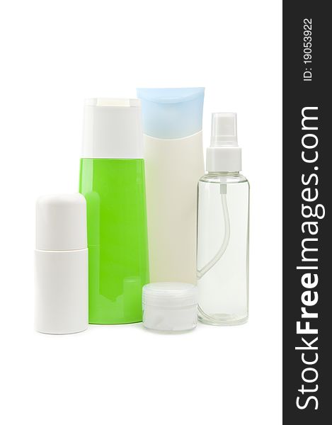 Set of cosmetic bottles isolated on white background