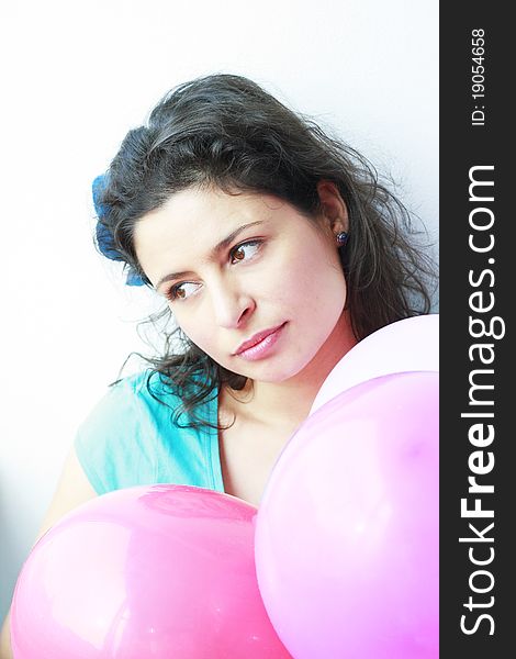 Romantic girl with a sad look having balloons in her hands. Romantic girl with a sad look having balloons in her hands
