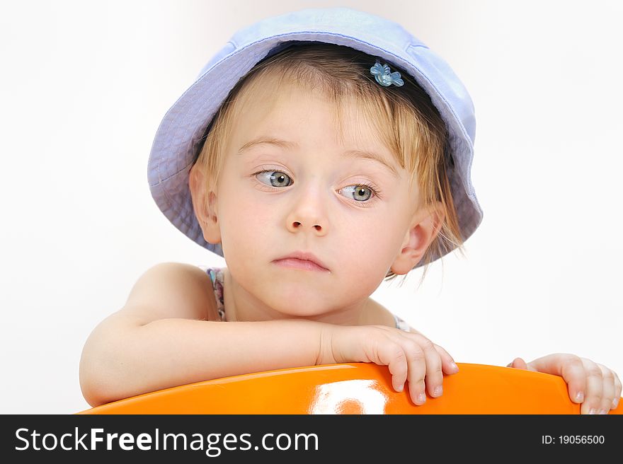 Fashion little girl in studio isolated on white