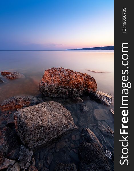 Sunset on the rocky coast