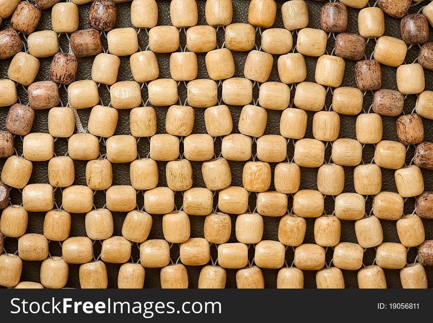 Background of wooden beads usually used as a back support on vehicle seats