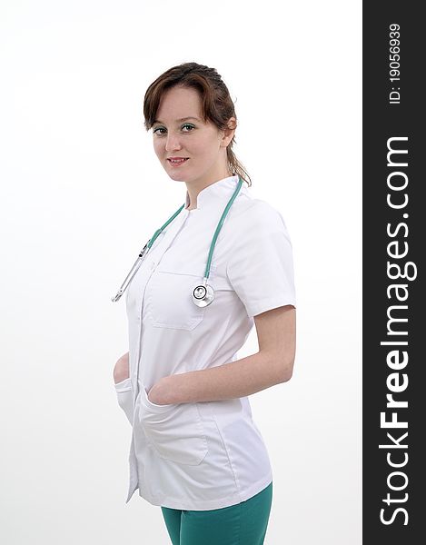 Attractive physician practicing in hospital. Attractive physician practicing in hospital