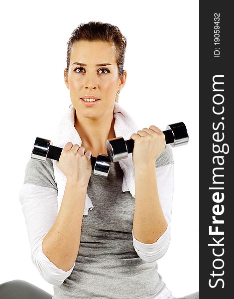 Girl exercising with weights, on a white background. Girl exercising with weights, on a white background
