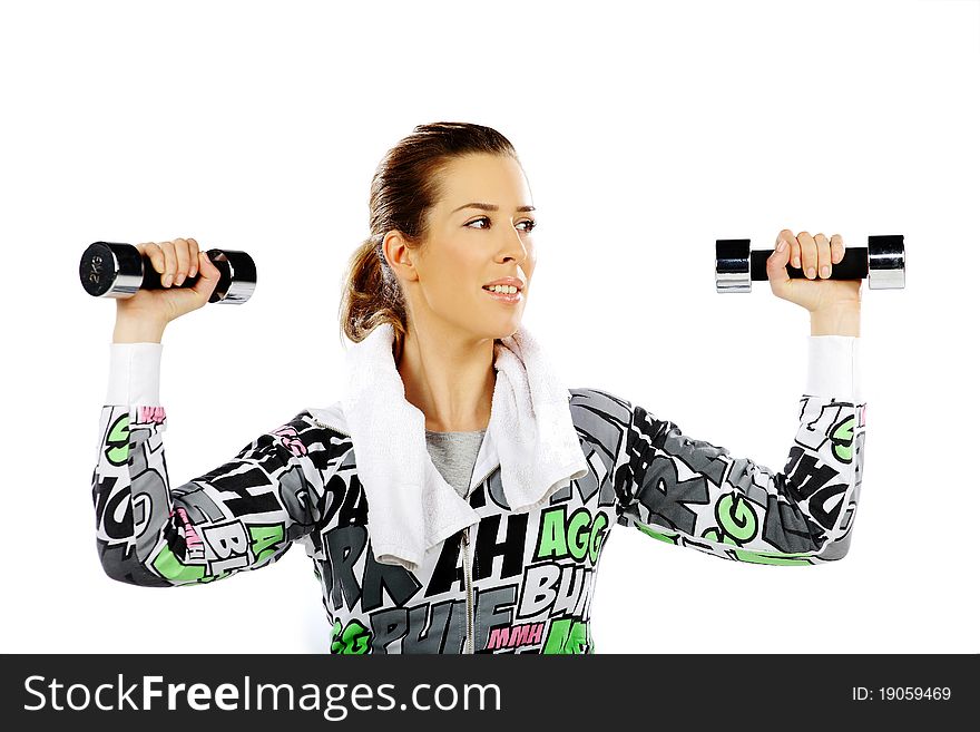 Girl exercising with weights, on a white background. Girl exercising with weights, on a white background