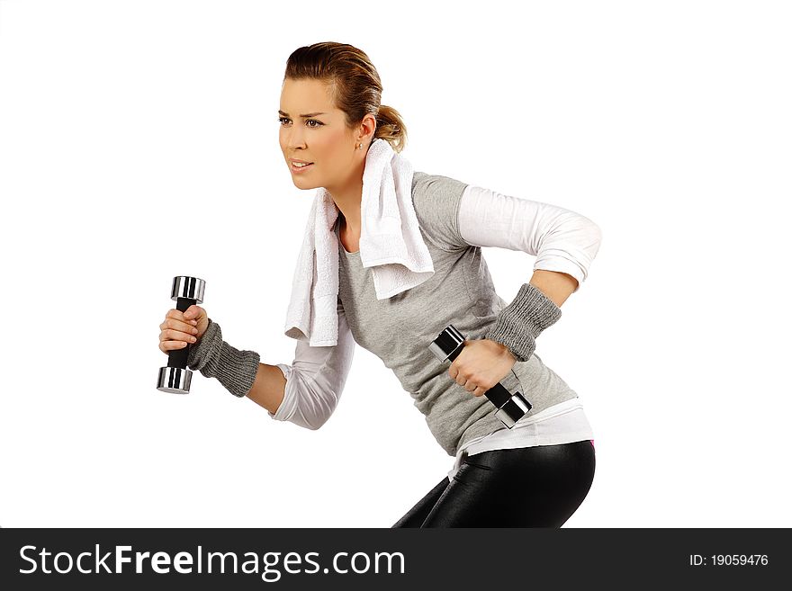 Girl exercising with weights, on a white background