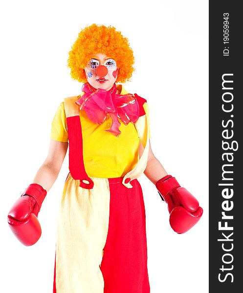 Girl clown in colorful costume funny scene