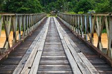 Old Bridge Over A Brown River Stock Photo Old Bridge Over A Brown River Stock Photo