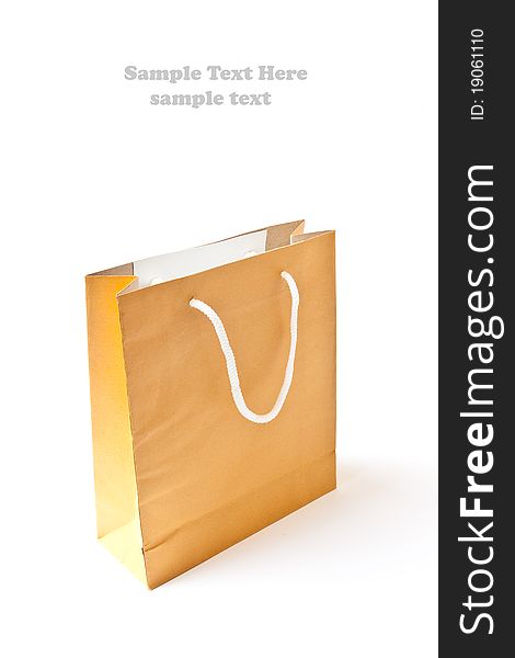 Brown shopping paper bag isolated on white background