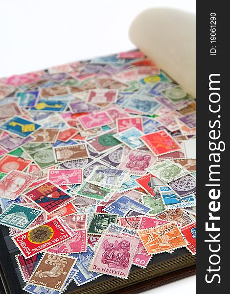Page of an album covered with Swiss postal stamps. Page of an album covered with Swiss postal stamps