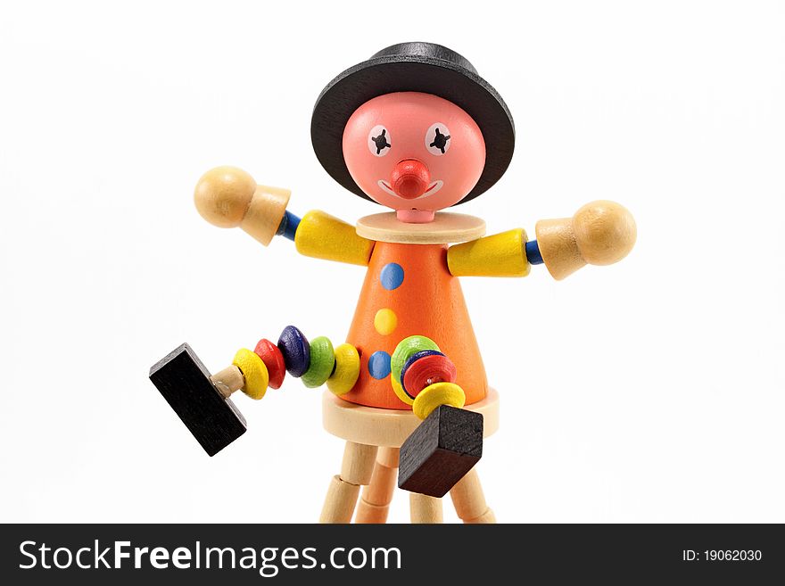 Cheerful wooden clown toy isolated on white background