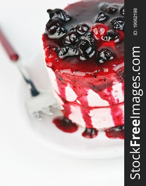 Cake with blackberry jam closeup
