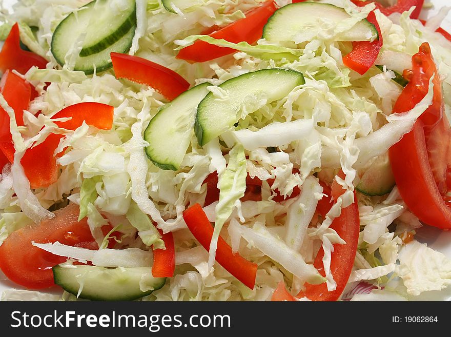 Vegetable salad with Peking cabbage tomato and cucumber