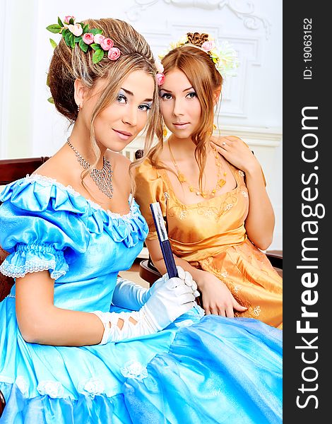 Two beautiful women in medieval era dresses. Two beautiful women in medieval era dresses.