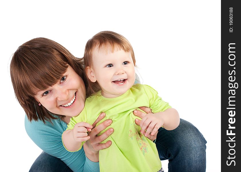 Young little daughter and his pretty young mother isolated