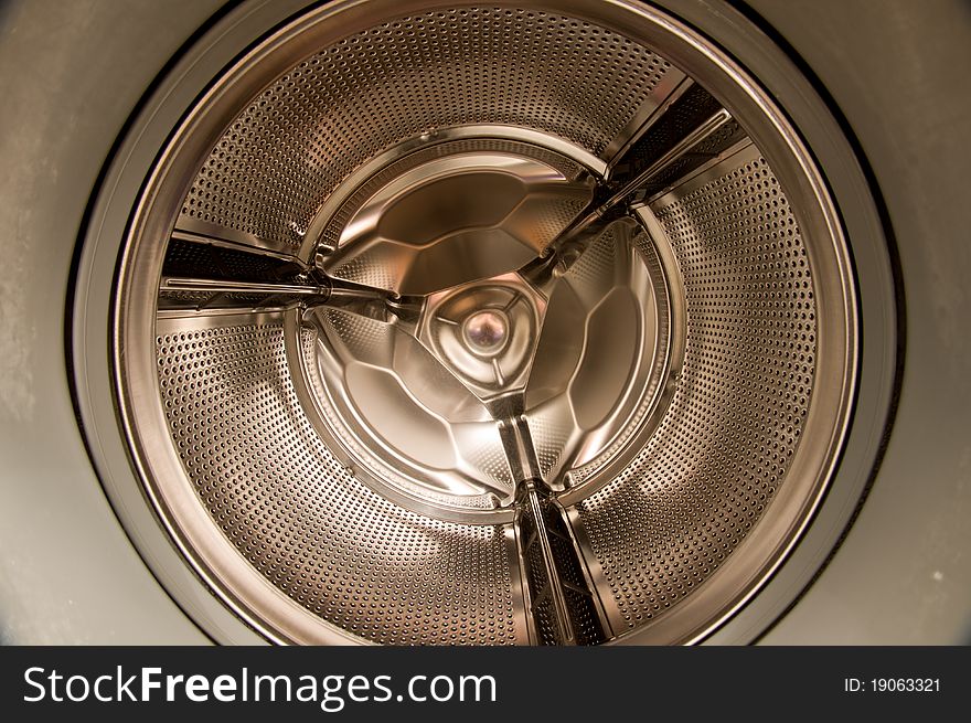 Inside an empty washing machine. Inside an empty washing machine