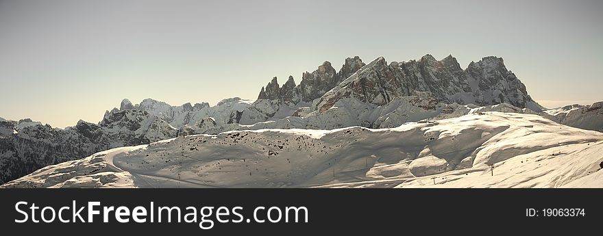 Winter panorama of Dolomites. Cimon della Pala, Vezzana, Bureloni, Monte Mulaz. Taken from Col Margherita ski tracks. Winter panorama of Dolomites. Cimon della Pala, Vezzana, Bureloni, Monte Mulaz. Taken from Col Margherita ski tracks.