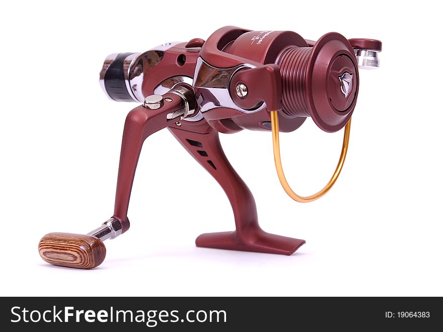 Inertia-free spinning reel isolated on a white background