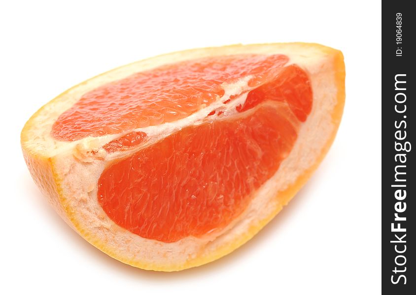 Grapefruit slice on white background