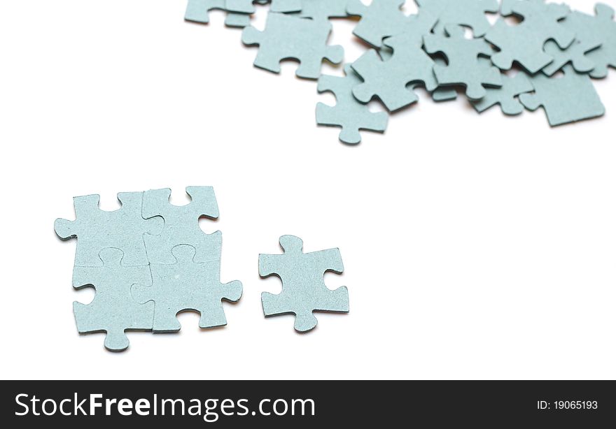 The puzzle pieces on white background. The puzzle pieces on white background