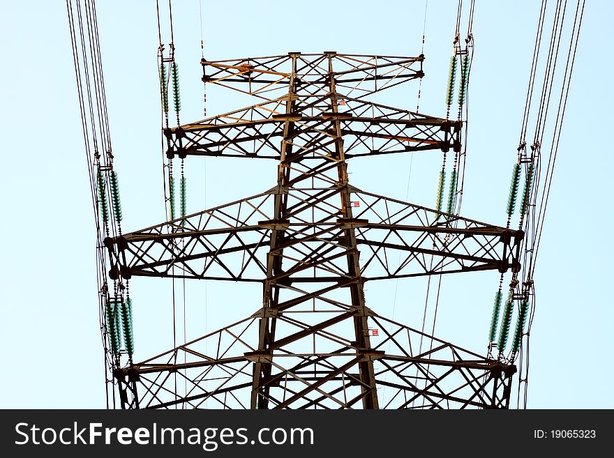 High tension line with blue sky