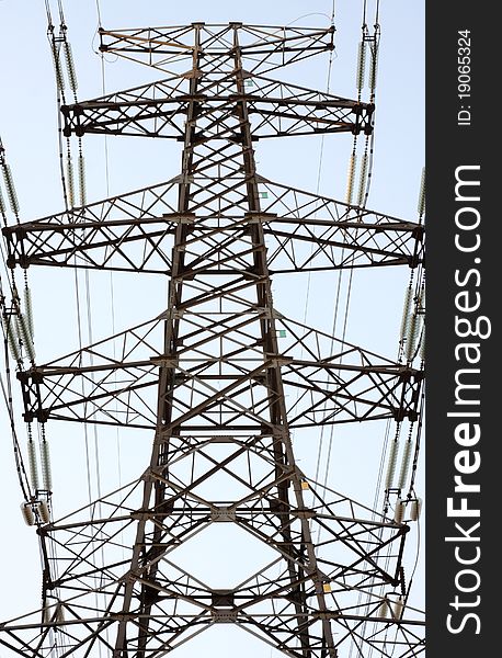 High tension lines with blue sky