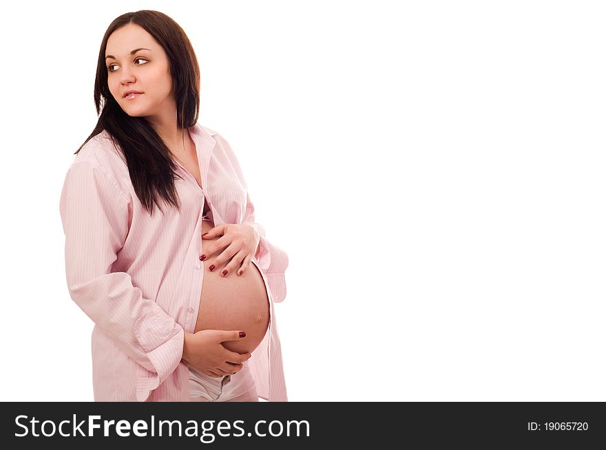 Joyful beautiful young pregnant woman. Joyful beautiful young pregnant woman