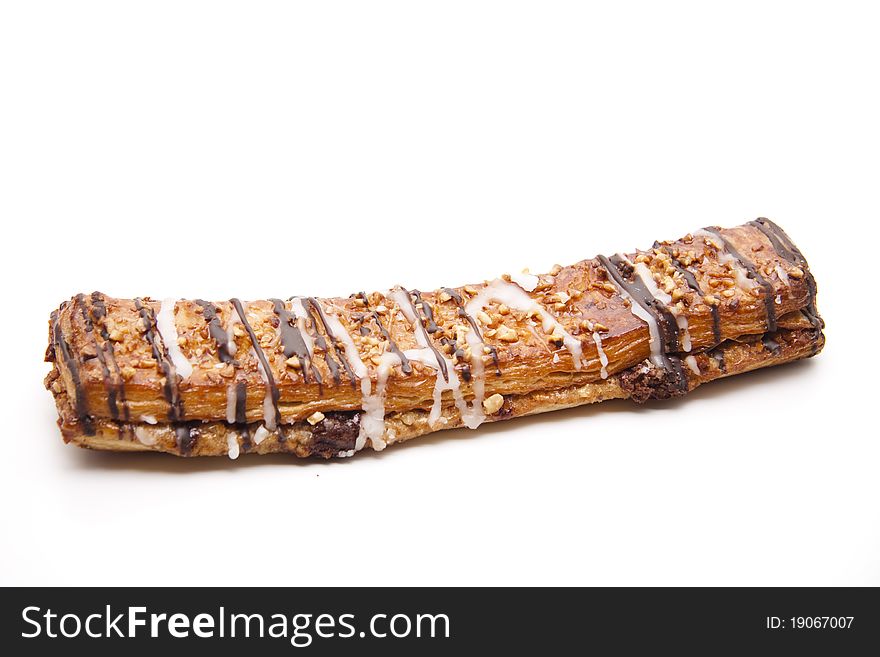 Nut pastry with chocolate onto white background