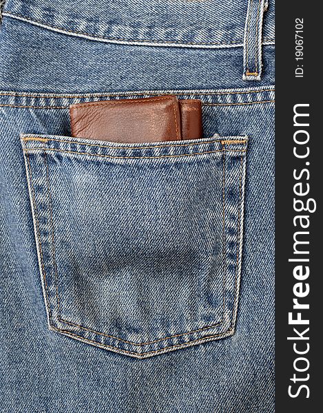 A clean blue jeans with wrench in the back pocket