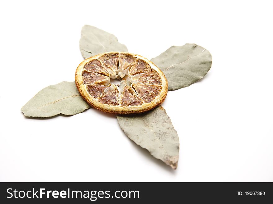 Dry lemon cut with bay leaf