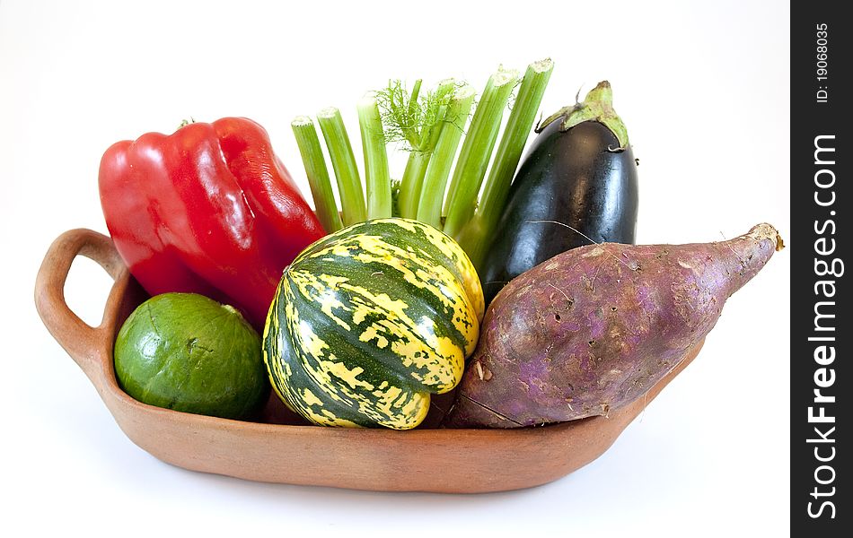 Earthenware dish with various vegetables