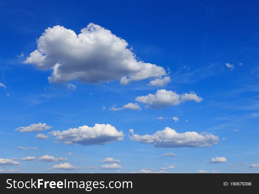 Fluffy clouds in the blue sky, beautiful summer sky