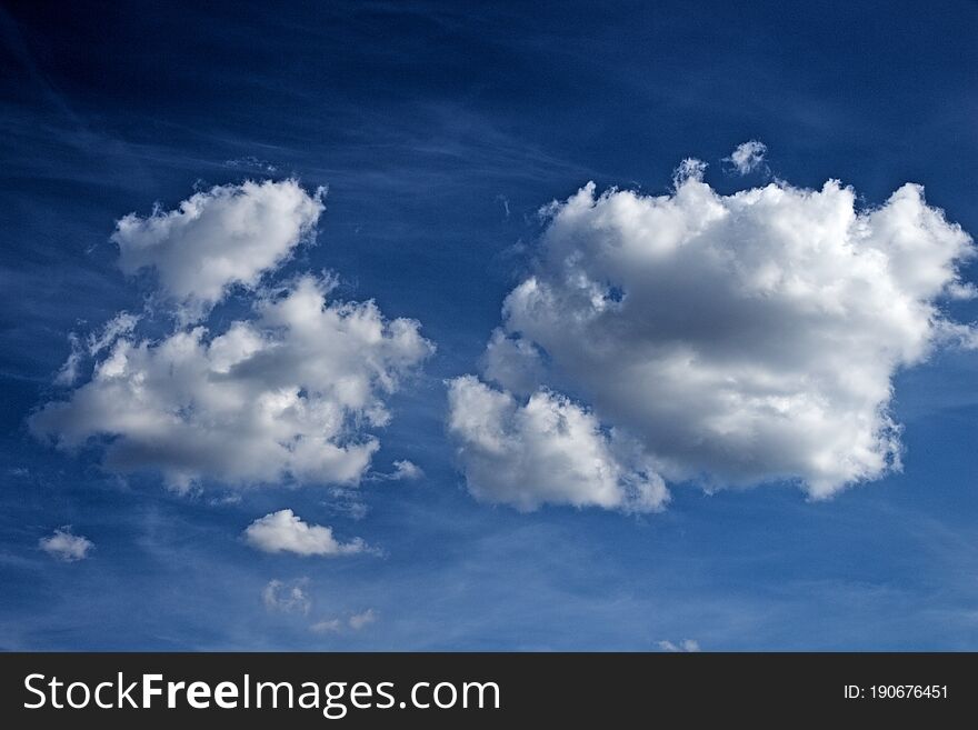 Fluffy clouds in the blue sky, beautiful summer sky