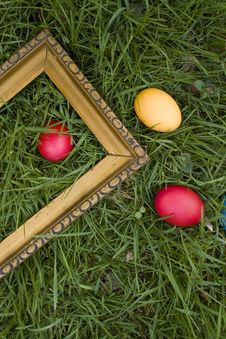 Colored Eggs And Frame Stock Photography