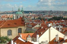 St. Nicholas Church And The Red Roofs In Prague Stock Images