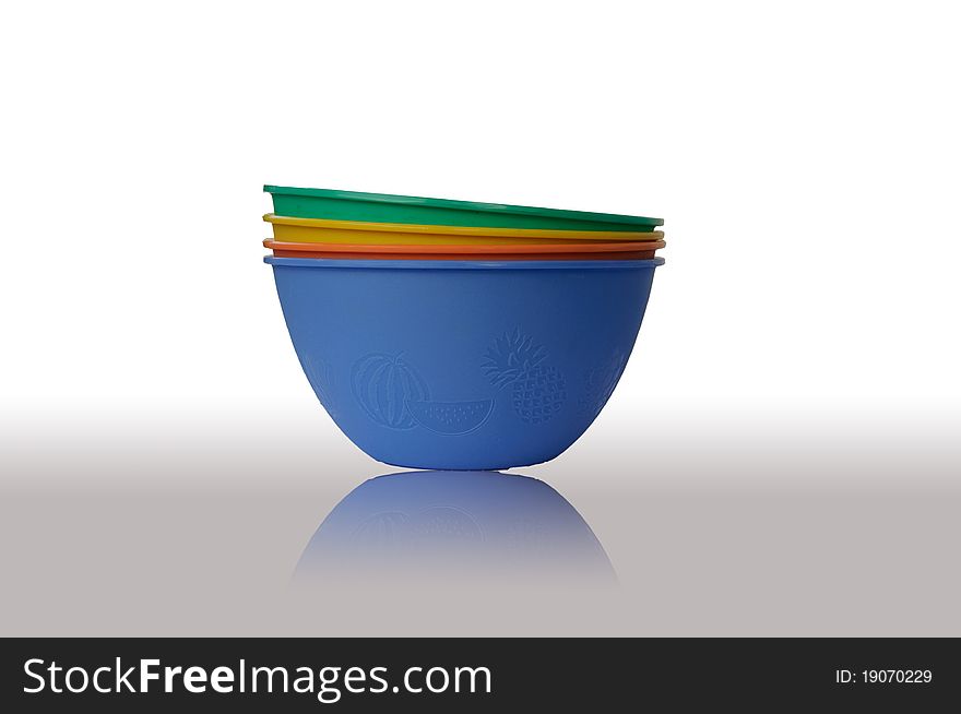 Colorful bowls on white background