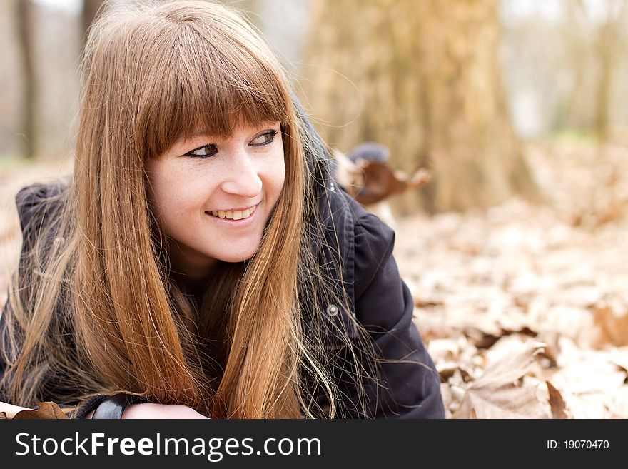 Single young beautiful woman relaxing outdoor. Single young beautiful woman relaxing outdoor