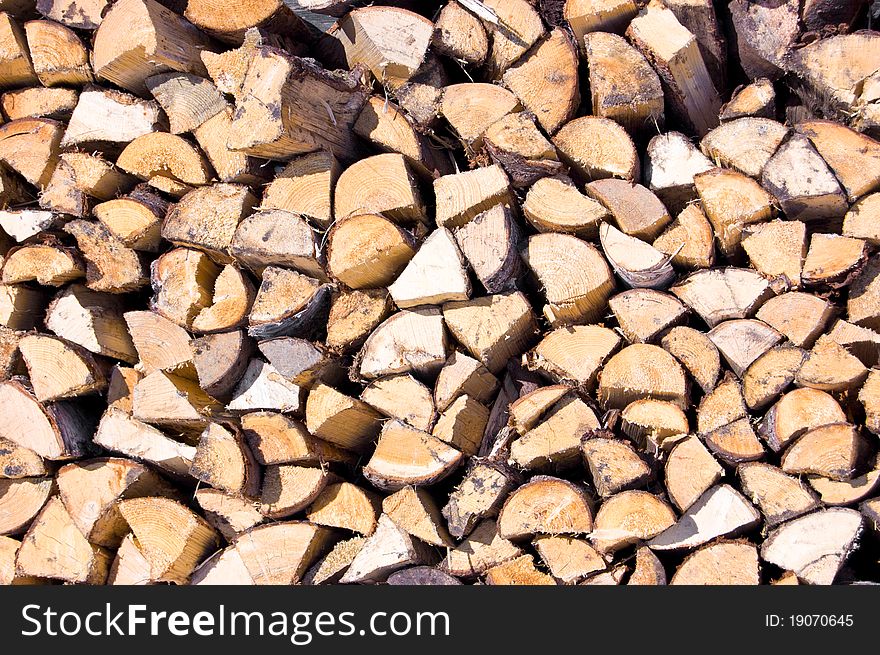 Firewood split combined with stack an end view