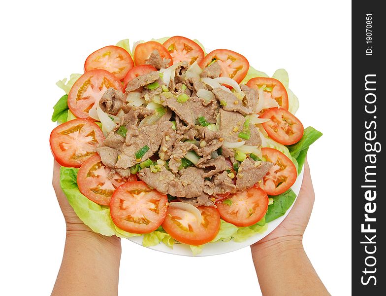 A plate of Boneless beef with vegetables. A plate of Boneless beef with vegetables