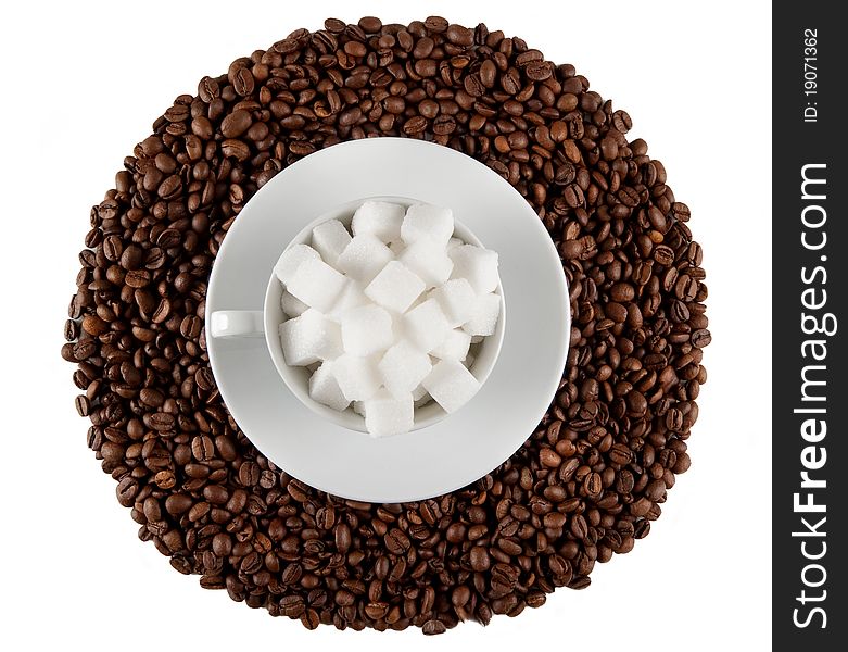 Coffee cup with beans and lump sugar isolated on w hite