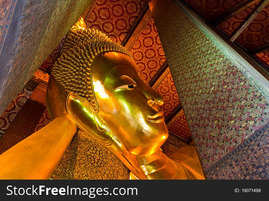 The golden sleeping buddha statue