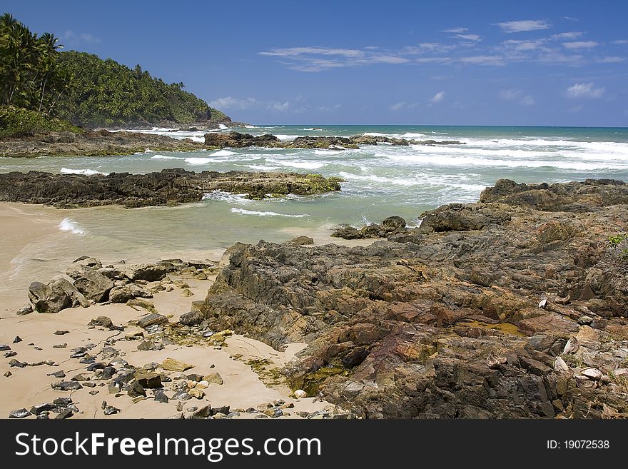 A beach and rocks in Itacaré, Bahia, Brazil. A beach and rocks in Itacaré, Bahia, Brazil