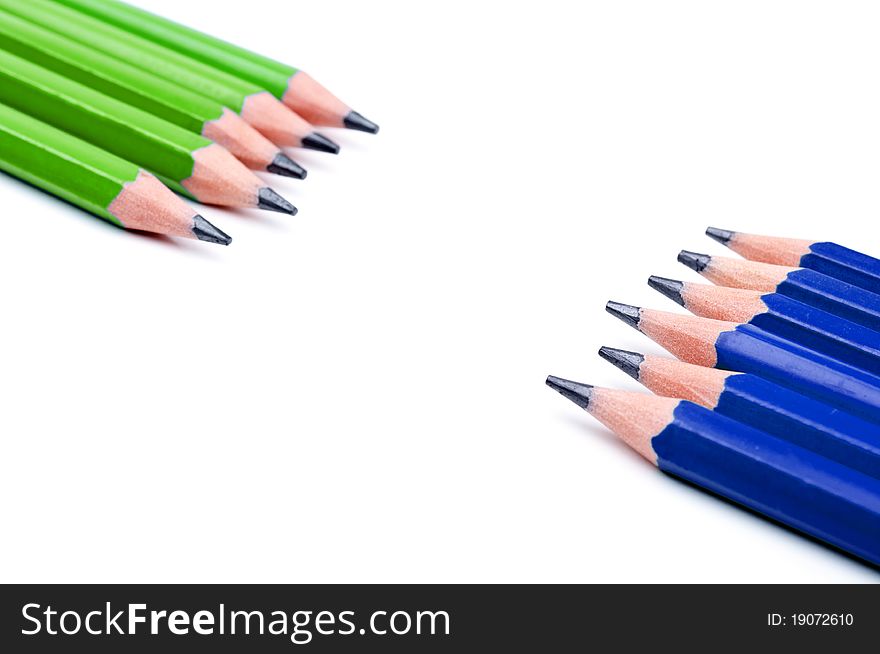 Green and blue pencil isolated on a white background