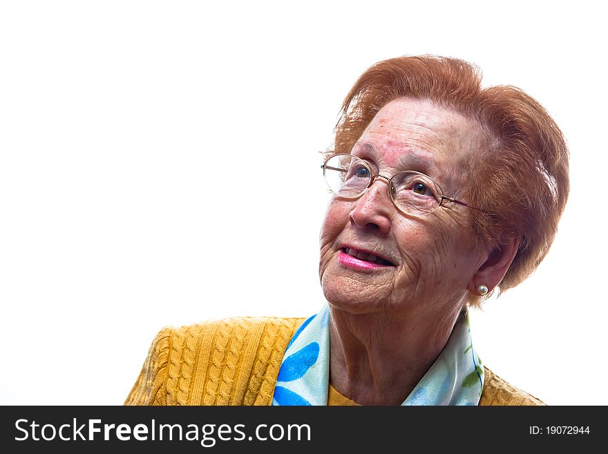 A retired woman smiling isolated