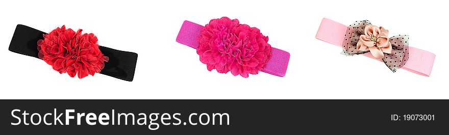 New coloured belts isolated over white background.
